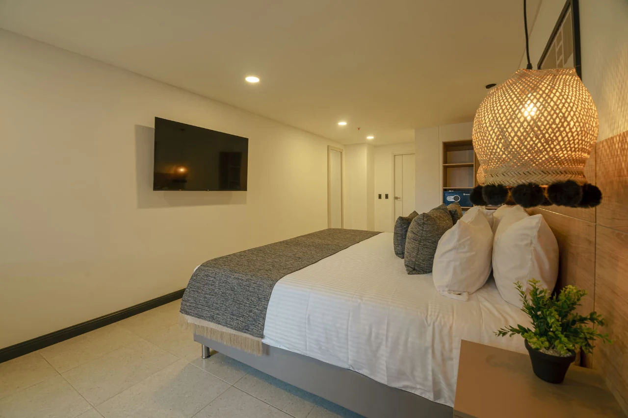 deluxe-room-first-class-hotel-medelin-bed-view-5.webp